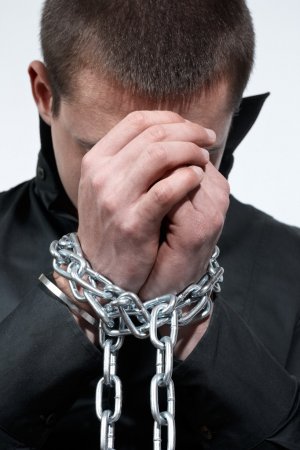 depositphotos_4628801-stock-photo-chained-hands